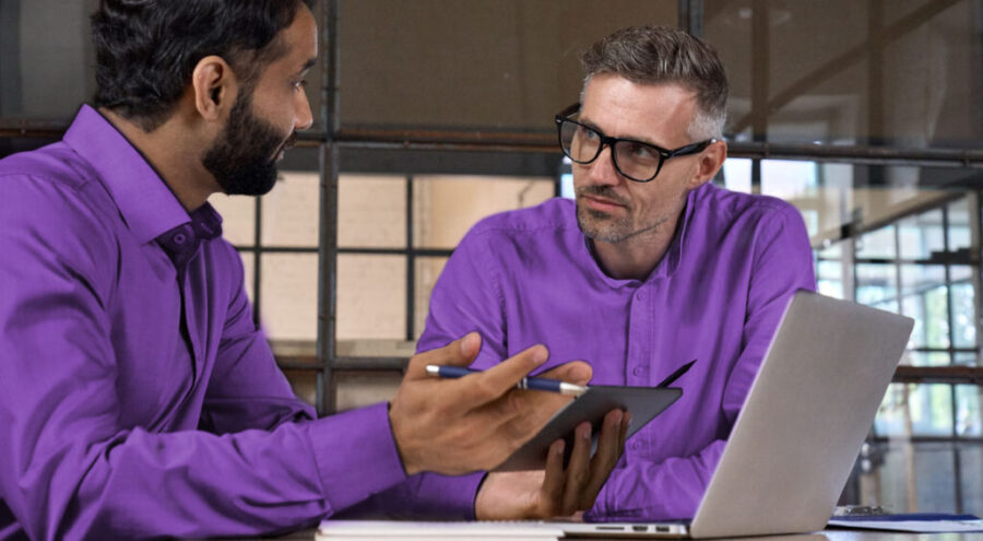 BrightSign team members consulting with one another